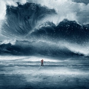 Man facing tsunami wave 17580401_s